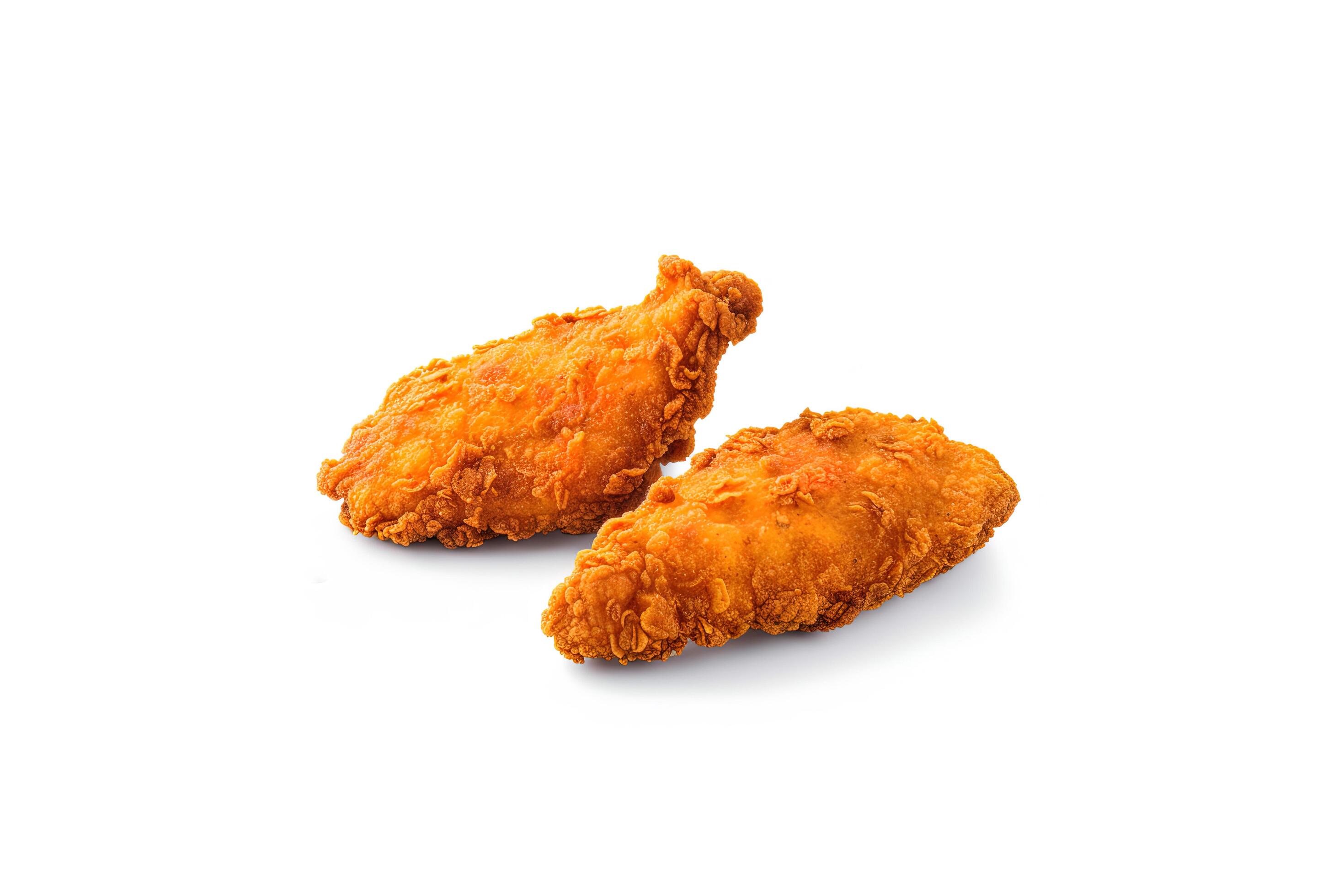 Crispy delicious fried chicken breast isolated on white background. AI