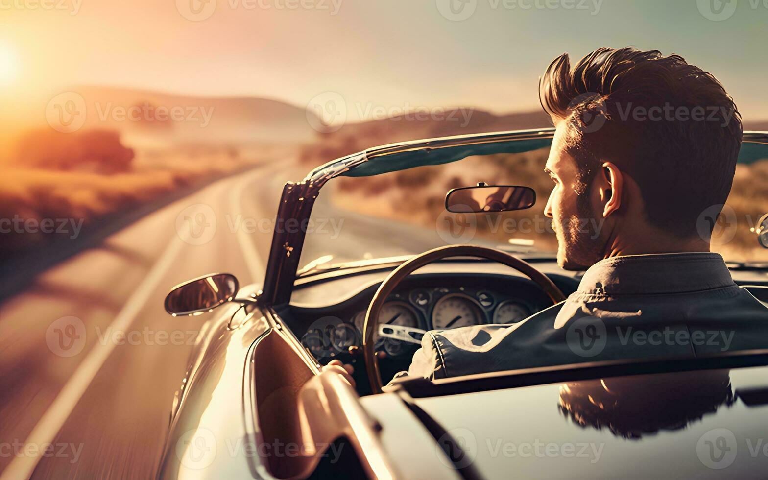 Young man driving in a convertible sports car photo from behind with copy space