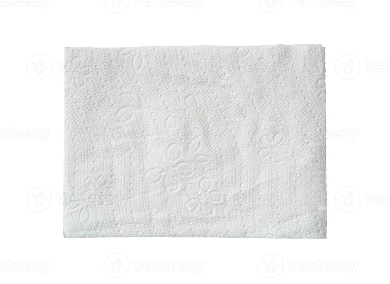 Top view of folded white tissue paper or napkin isolated on white background with clipping path photo