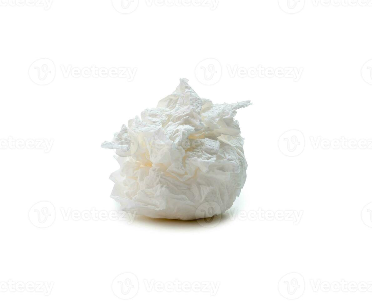 Single screwed or crumpled tissue paper ball or napkin in strange shape after use in toilet or restroom isolated on white background with clipping path photo