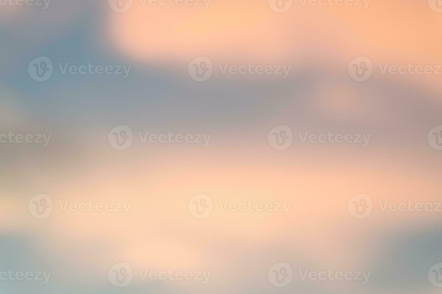 Blurred natural background texture of beautiful sky light with strange clouds in the morning or evening taken at the sea.Sun is setting or rising at the sea photo