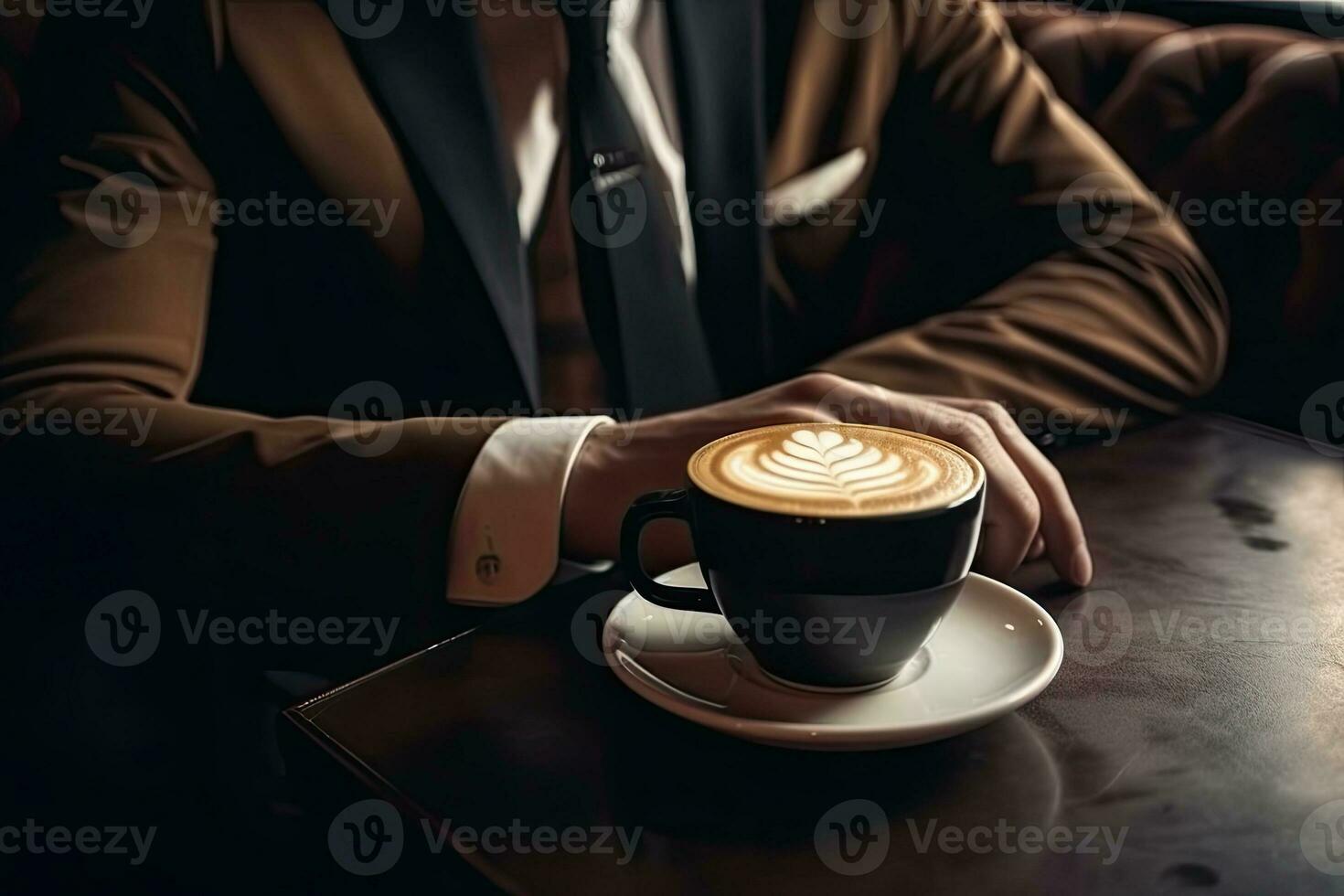 https://static.vecteezy.com/system/resources/previews/023/981/134/non_2x/close-up-young-man-in-work-clothes-with-hot-coffee-in-a-cafe-photo.jpeg