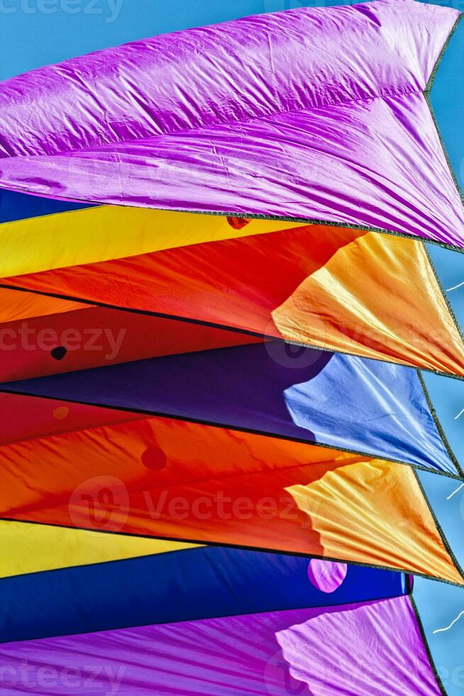 a cloth with a multicolored design and a kite motif photo