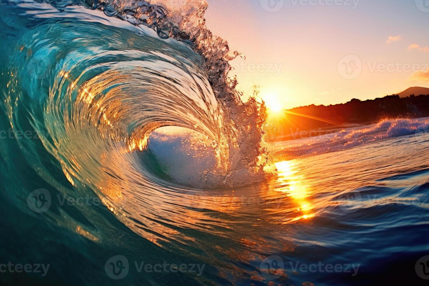 The large ocean wave hitting the shore at sunset. photo