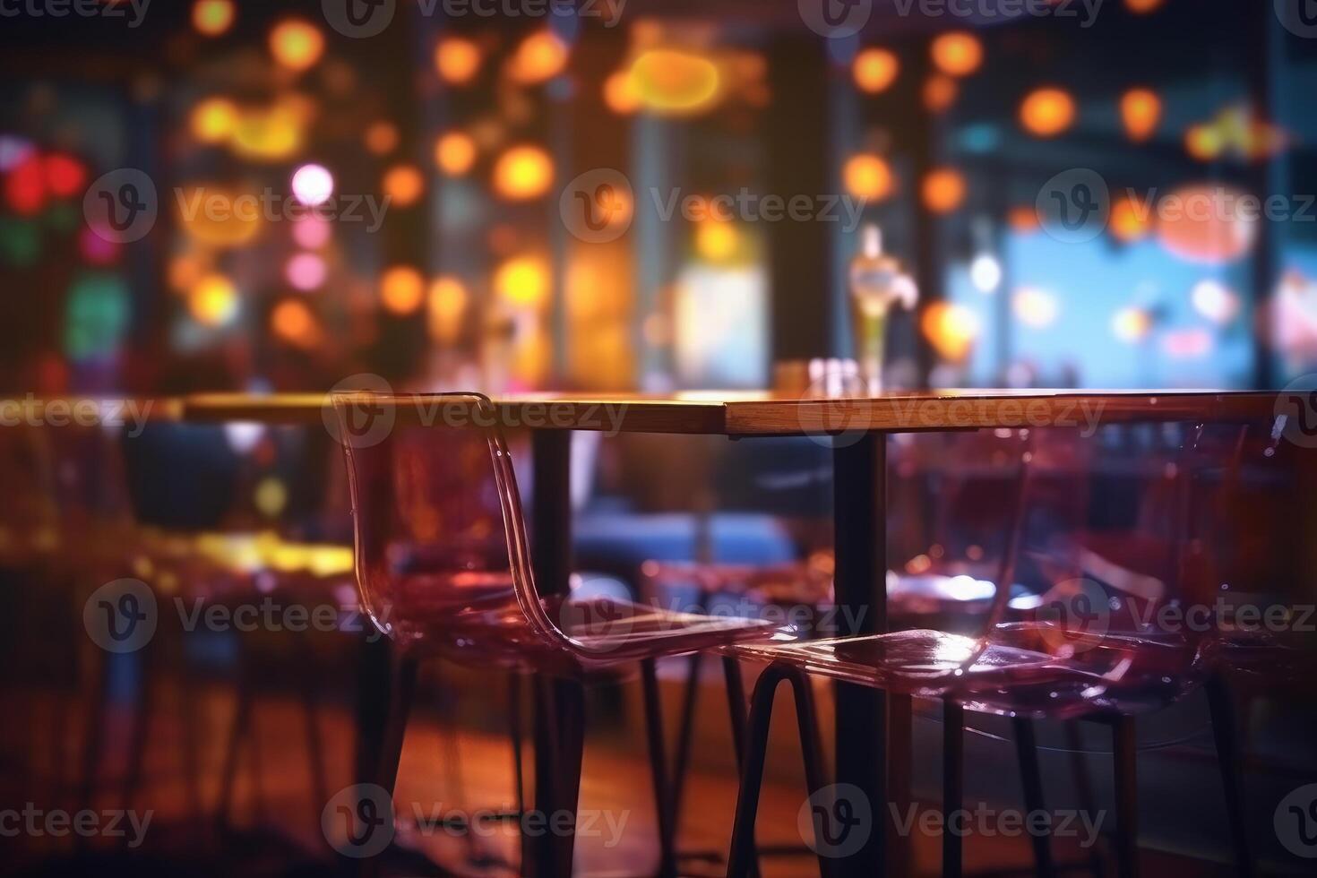 Blurred background of people sitting at restaurant. Bar or night club with lights bokeh. photo