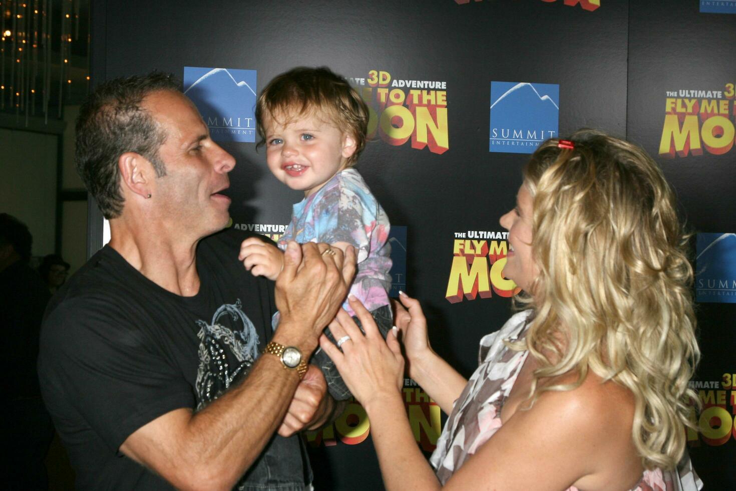 Lloyd Eisler  Kristy Swanson with their son Magnus arriving at the premiere of Fly Me To The Moon at the Directors Guild Theater in Los Angeles CA August 3 2008 2008 Kathy Hutchins Hutchins Photo