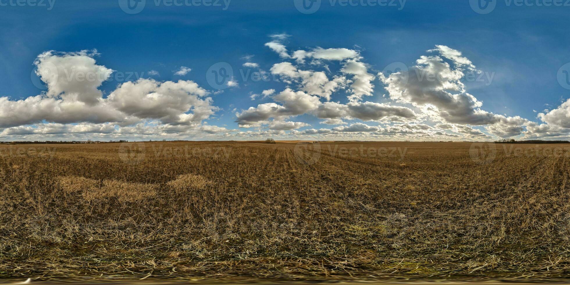 spherical 360 hdri panorama among farming field with clouds on blue sky in equirectangular seamless projection, use as sky replacement in drone panoramas, game development as sky dome or VR content photo