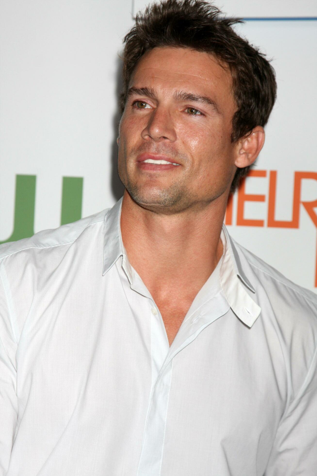 Ethan Erickson arriving at Melrose Place Premiere Party on Melrose