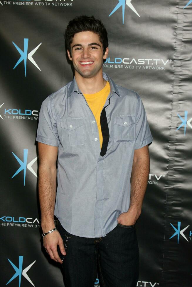 LOS ANGELES - DEC 14, Max Ehrich attends the Miss Behave Season Two Premiere Party at Flappers Comedy Club on December 14, 2010 in Burbank, CA photo