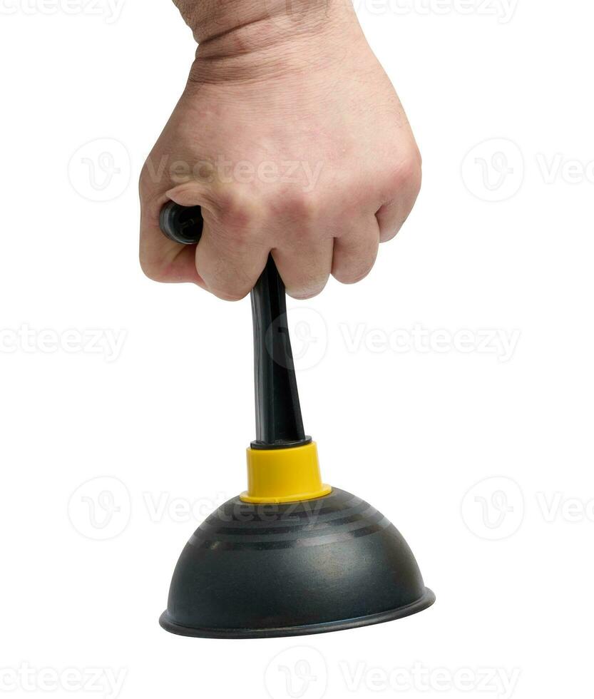 Black rubber plunger in a male hand on a white isolated background photo