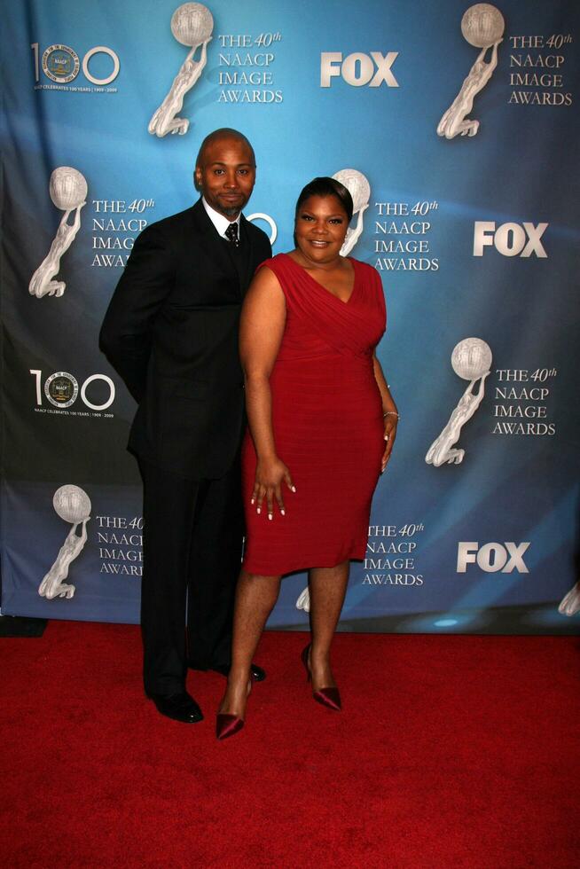 MoNique  Husband Sidney Hicks arriving at the 40th Annual NAACP Image Awards at the Shrine Auditorium in Los Angeles CA on February 12 2009 2009 Kathy Hutchins Hutchins Photo