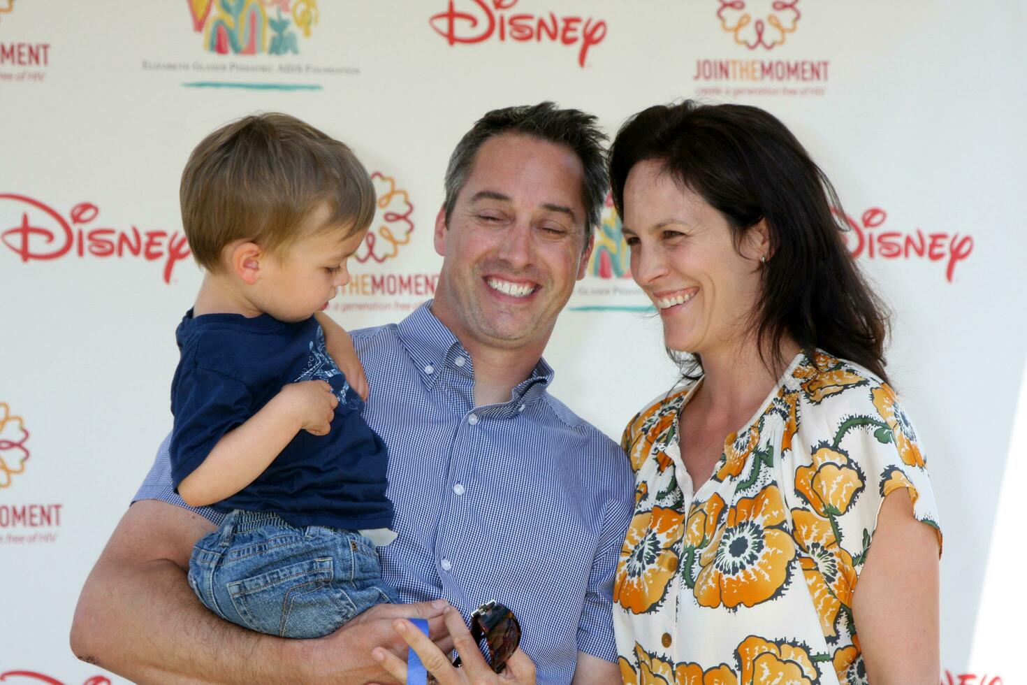 Annabeth Gish and husband and son arriving at A Time For Heroes Celebrity Carnival benefiting the Elizabeth Glaser Pediatrics AIDS Foundation at the Wadsworth Theater Grounds in Westwood , CA on June 7, 2009 photo