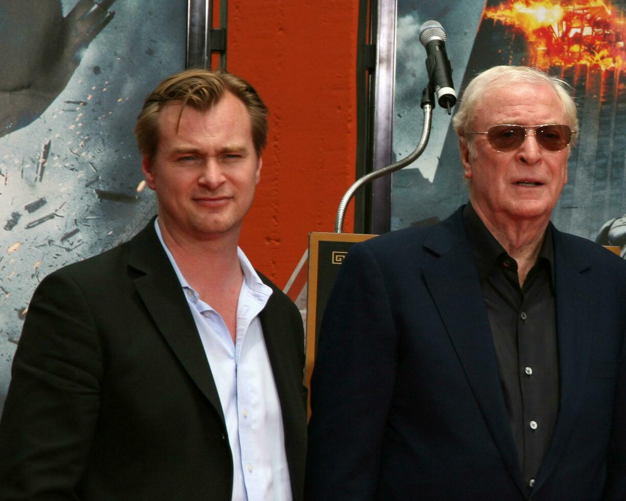 Christopher Nolan  Michael Caine at the Ceremony honoring Michael Caine by placing his Handprint and Footprints in Cement at Graumans Chinese Theater in Hollywood CA on July 11 2008 2008 photo
