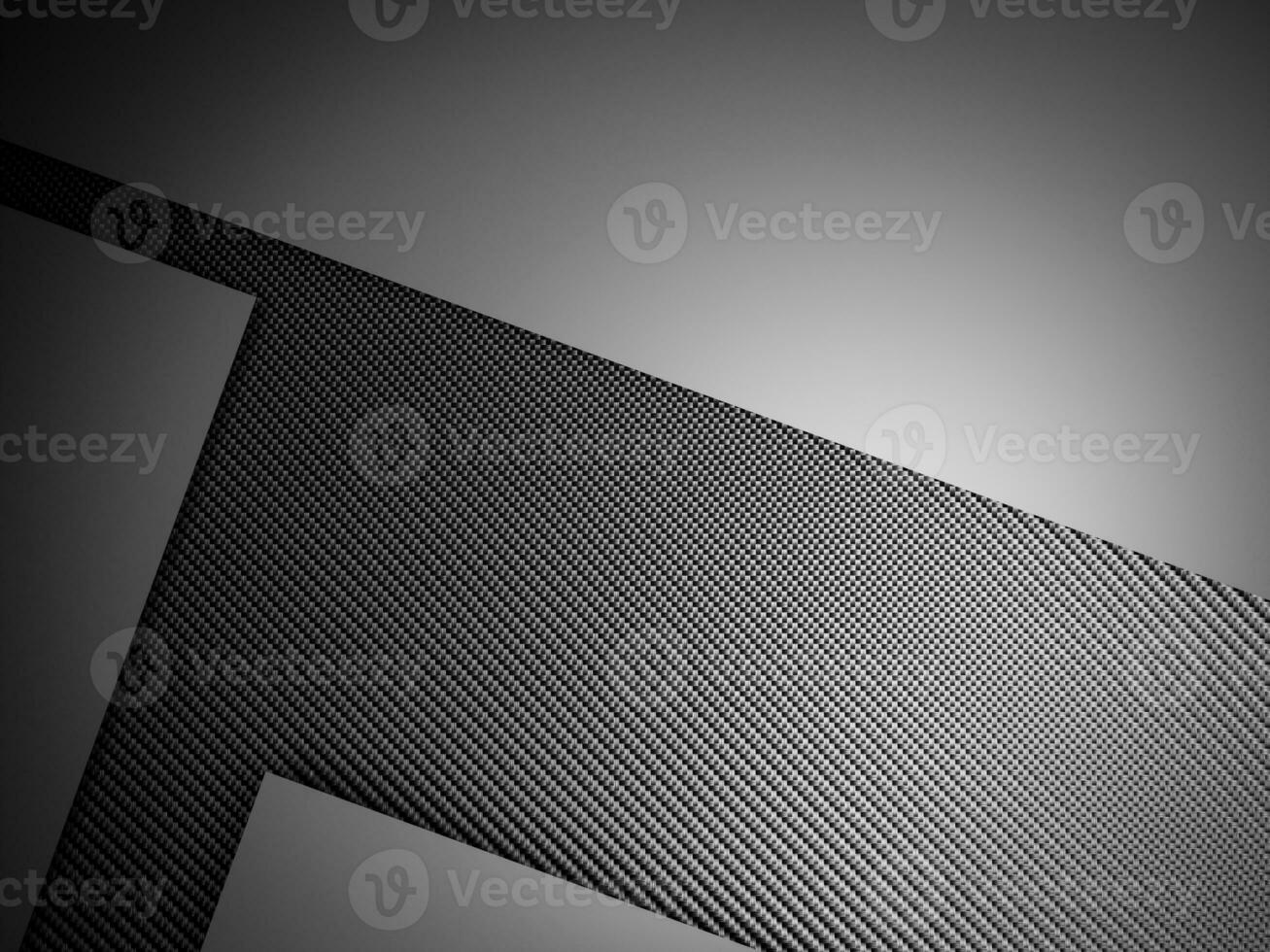 Abstract gradient metal background dark with carbon fiber texture photo