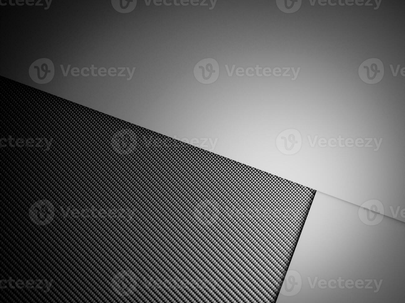 Abstract gradient metal background dark with carbon fiber texture photo