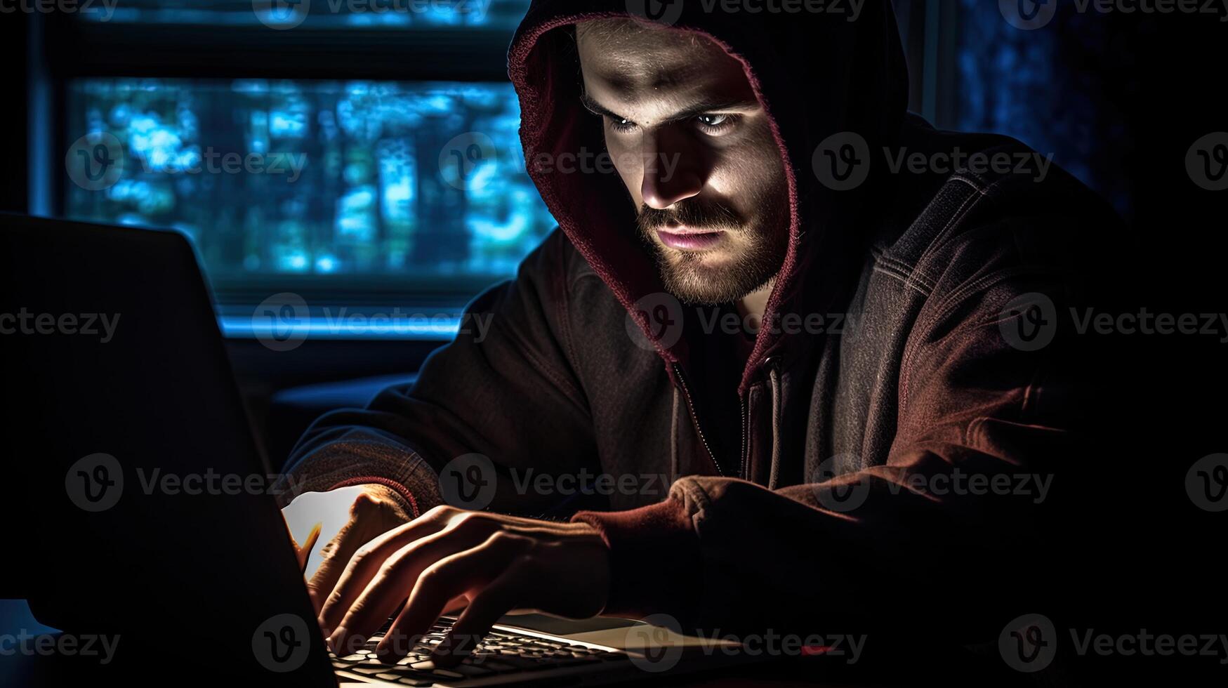 Young Man in Hoodie and Using Laptop Against Blue Digital Background. Internet, Cyber Crime, Cyber Attack and Malware Concept. Futuristic Holographic Interface to Display Data. . photo