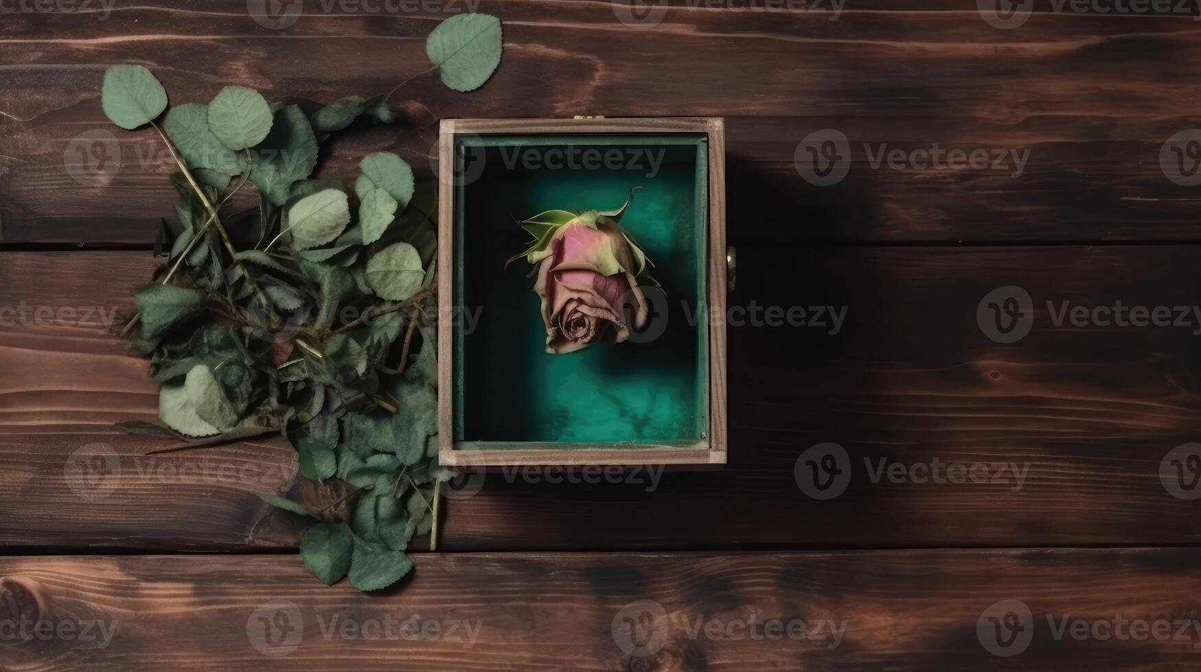 Rustic Style Open Wooden Box with Dried Rose Flower and Leaves on Table Top and Space for Message. . photo