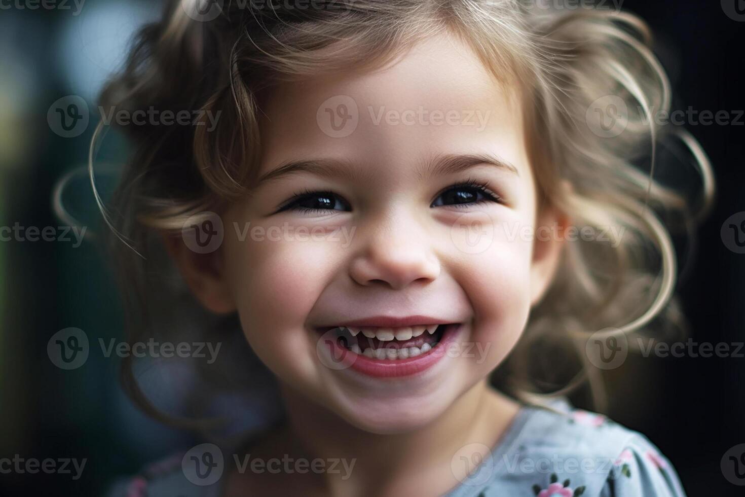 Portrait of a joyful smiling little girl. photo