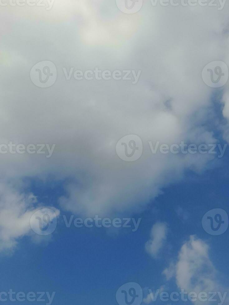 The white clouds on the blue sky are perfect for the background.  Skyscape on Lombok Island, Indonesia photo