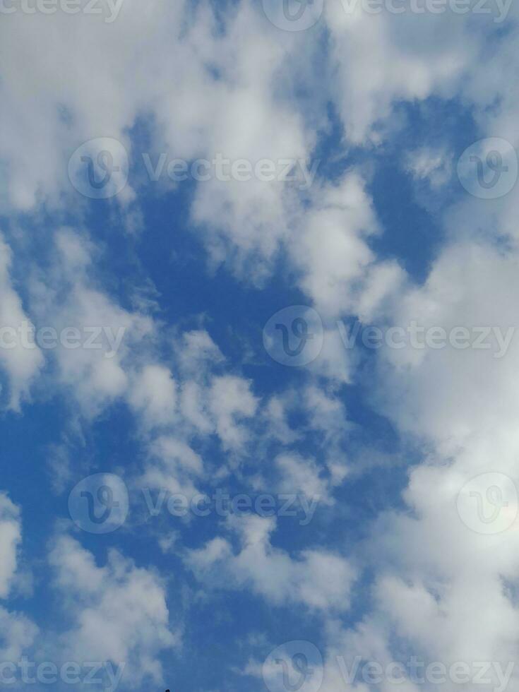 The white clouds on the blue sky are perfect for the background.  Skyscape on Lombok Island, Indonesia photo