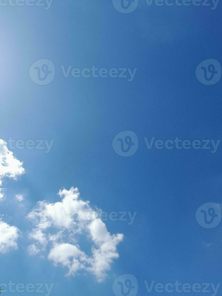 The white clouds on the blue sky are perfect for the background.  Skyscape on Lombok Island, Indonesia photo