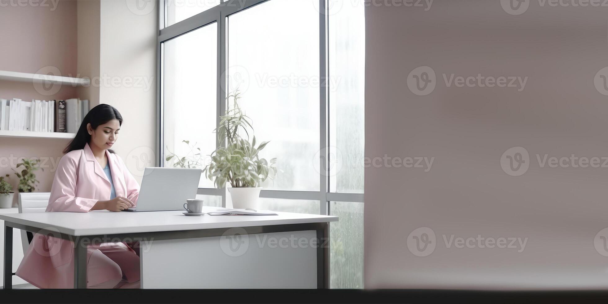 Businesswoman Wearing Pink Large Coat and Using Laptop on Workplace, . photo