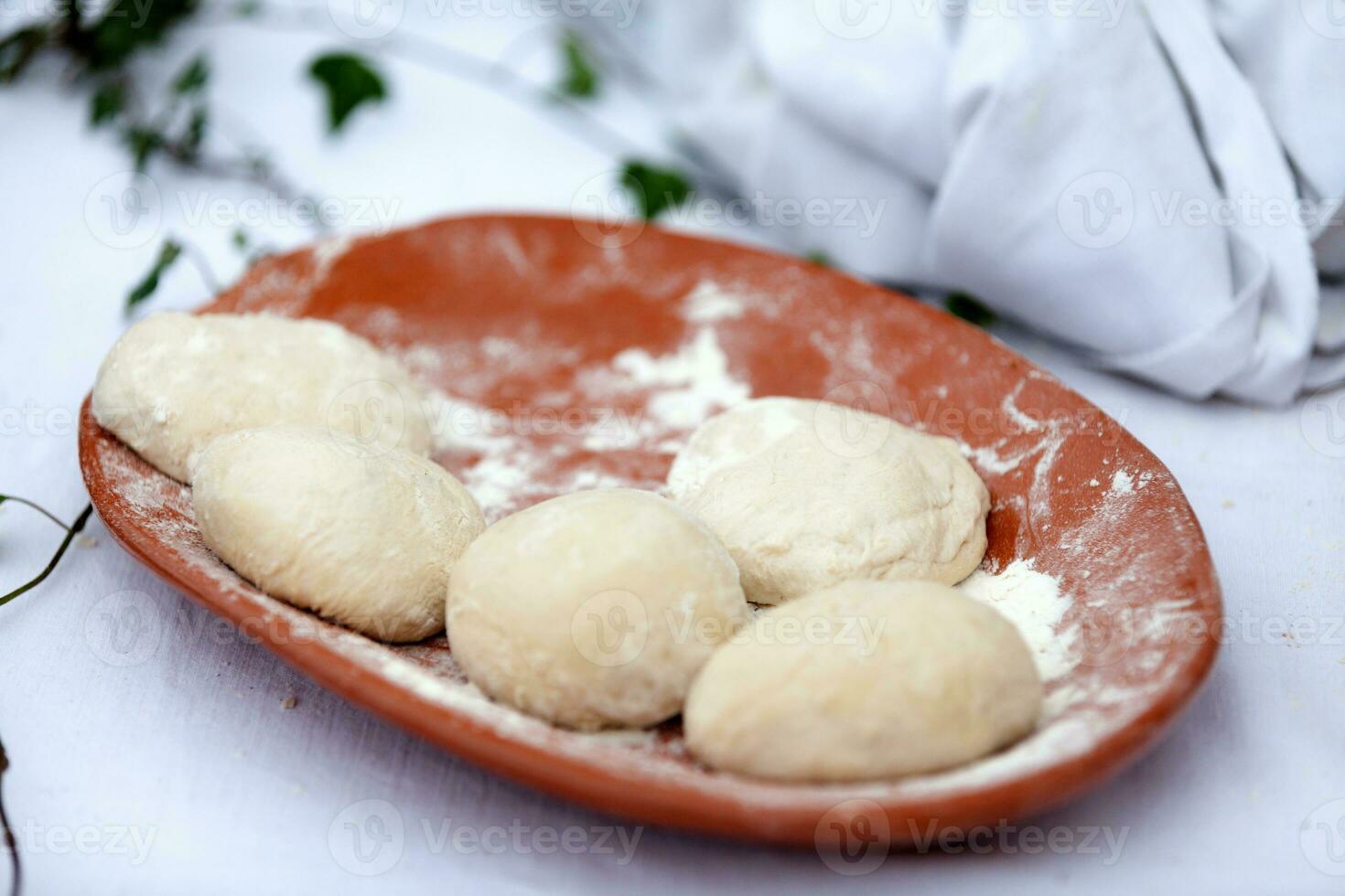 Fouace doughs on a tray photo