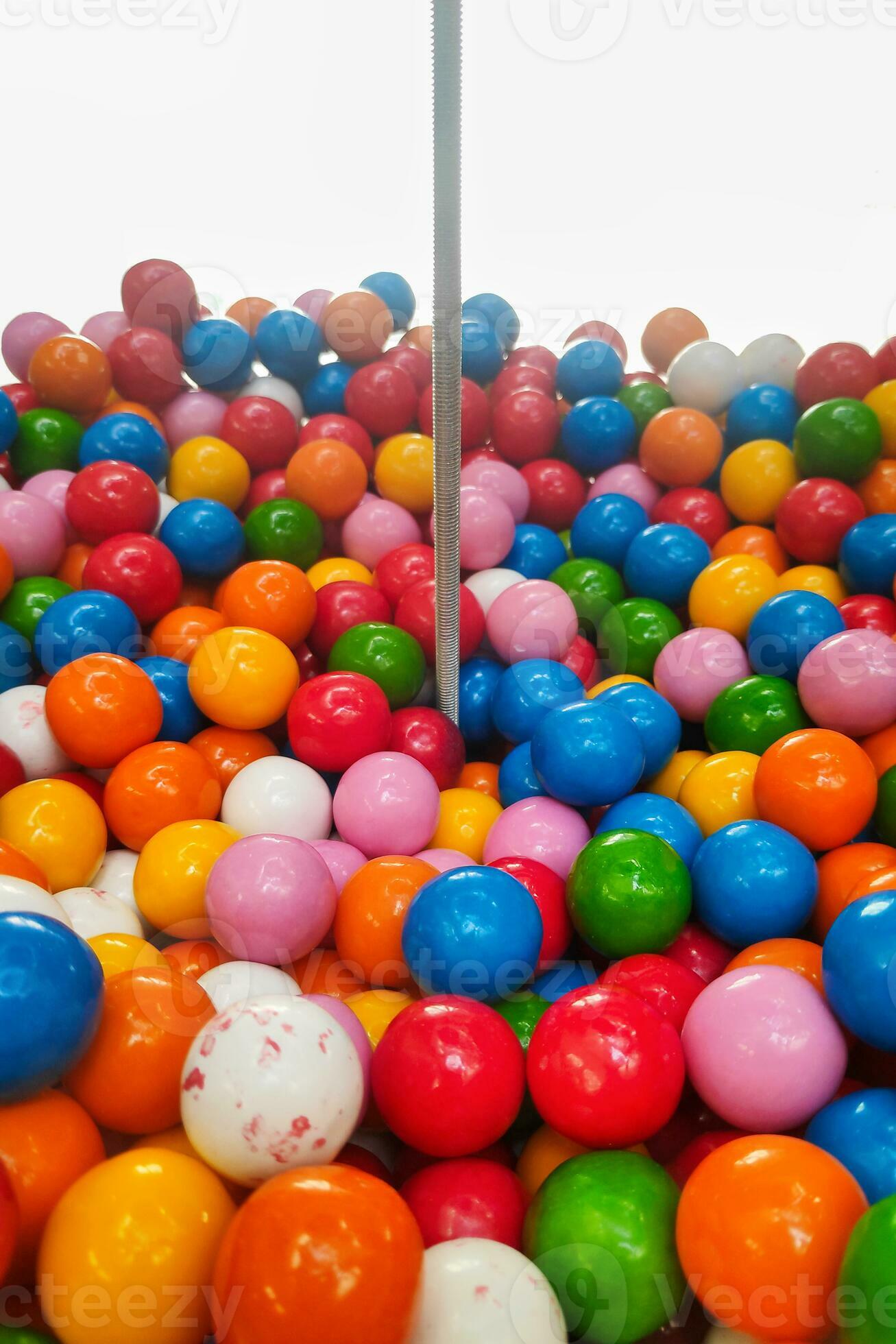 Inside a gumball machine 24038843 Stock Photo at Vecteezy