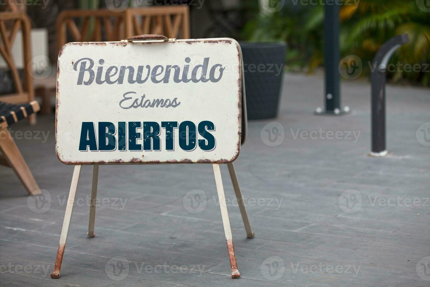 Outdoor open sign in Spanish photo