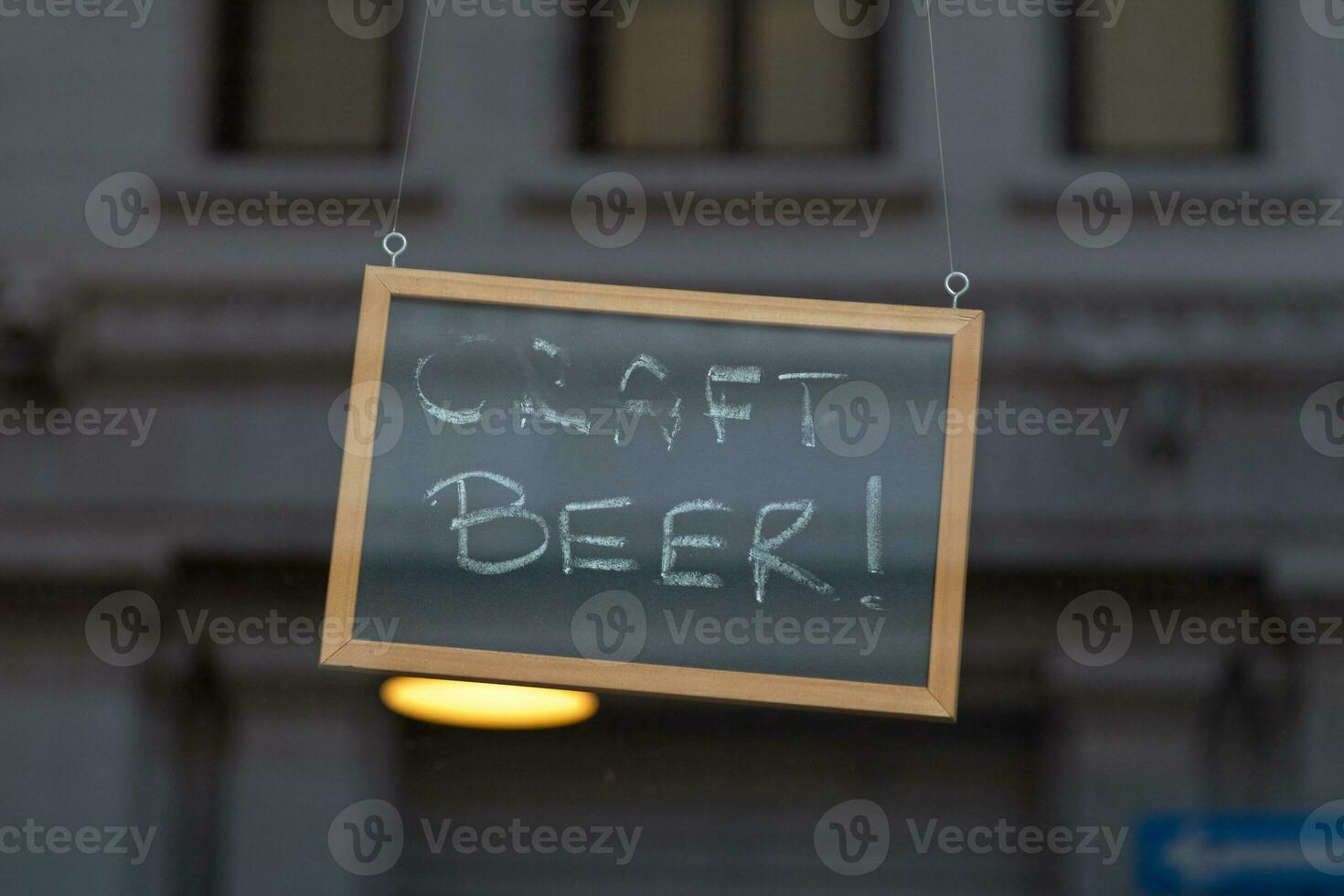 Craft beer written on a blackboard sign photo
