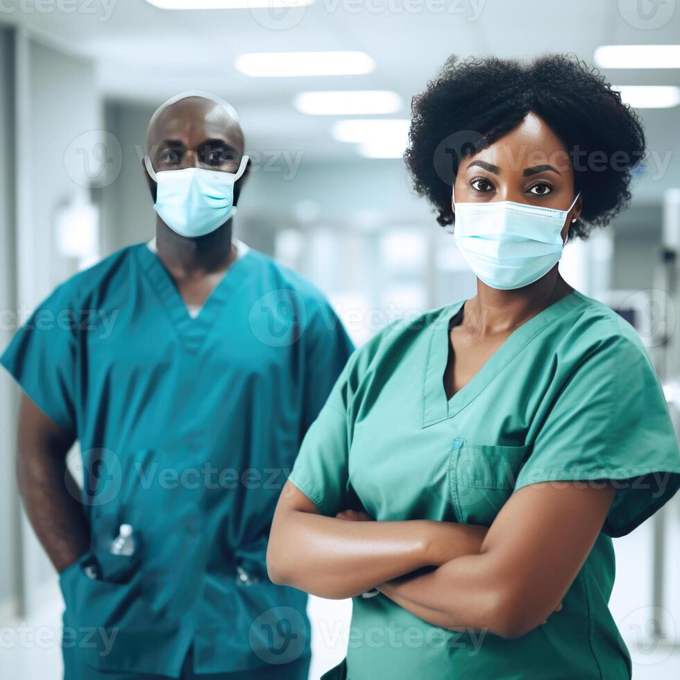 Portrait of African Male and Female Medical Professionals Standing in the Hospital Hallway, . photo