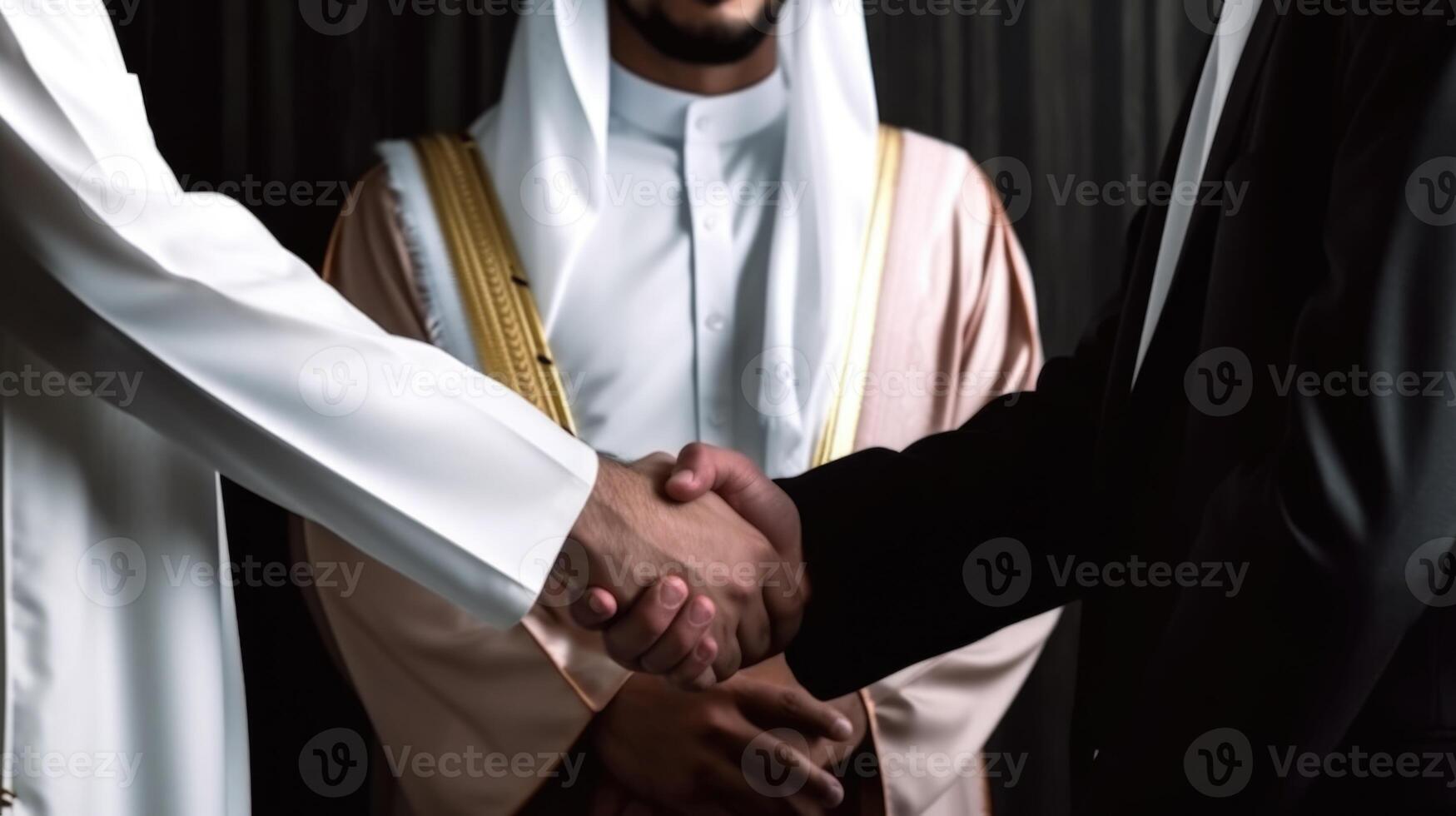 Business handshake between two Arabian Man. Close up on black Background. . photo