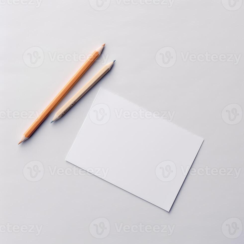 Top View Photo of Blank White Paper and Color Pencils Flat Lay, Mock Up for Placing Your Design. .