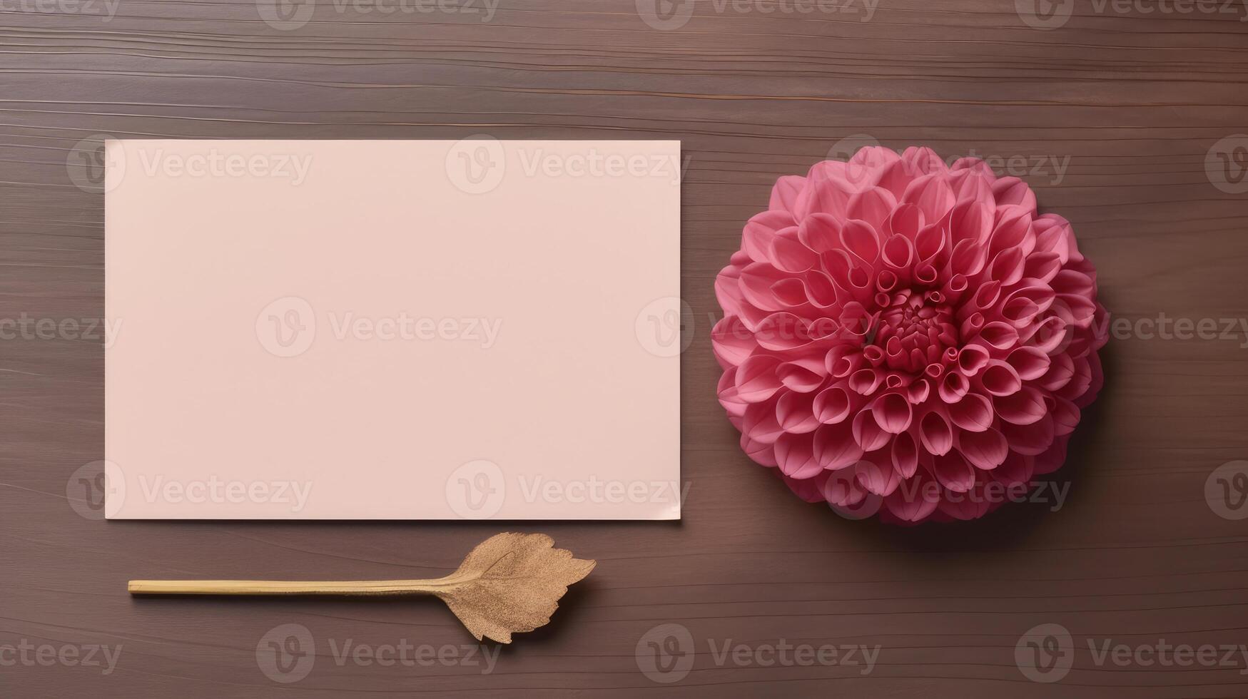 Top View of Blank Pink Paper Card Mockup with Beautiful Dahlia Flower on Wooden Table, . photo