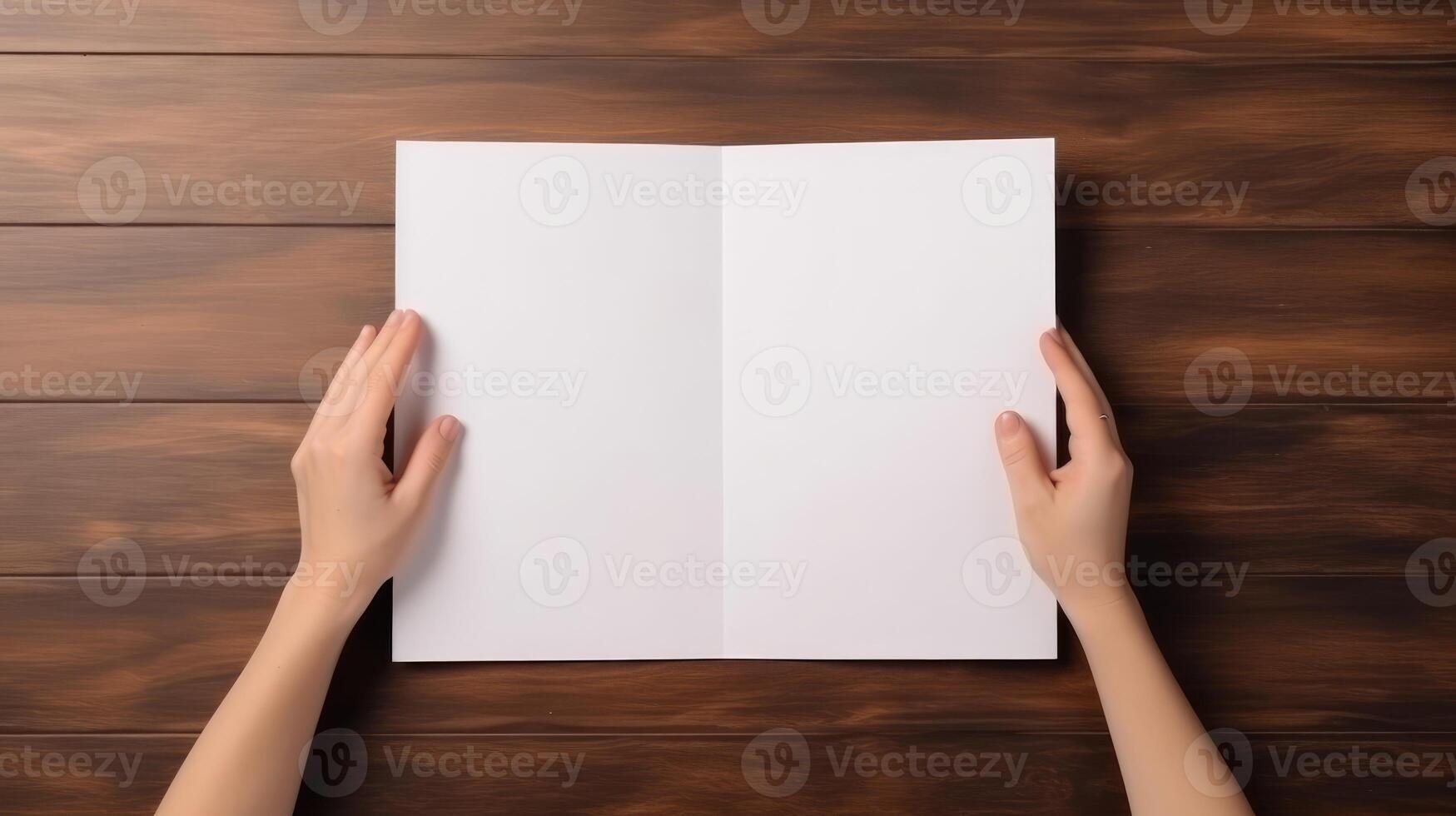 Top View Mockup of Human Hands Holding Blank White Bi-Fold Paper, Flat Lay on Wooden Table. Generative AI Technology. photo