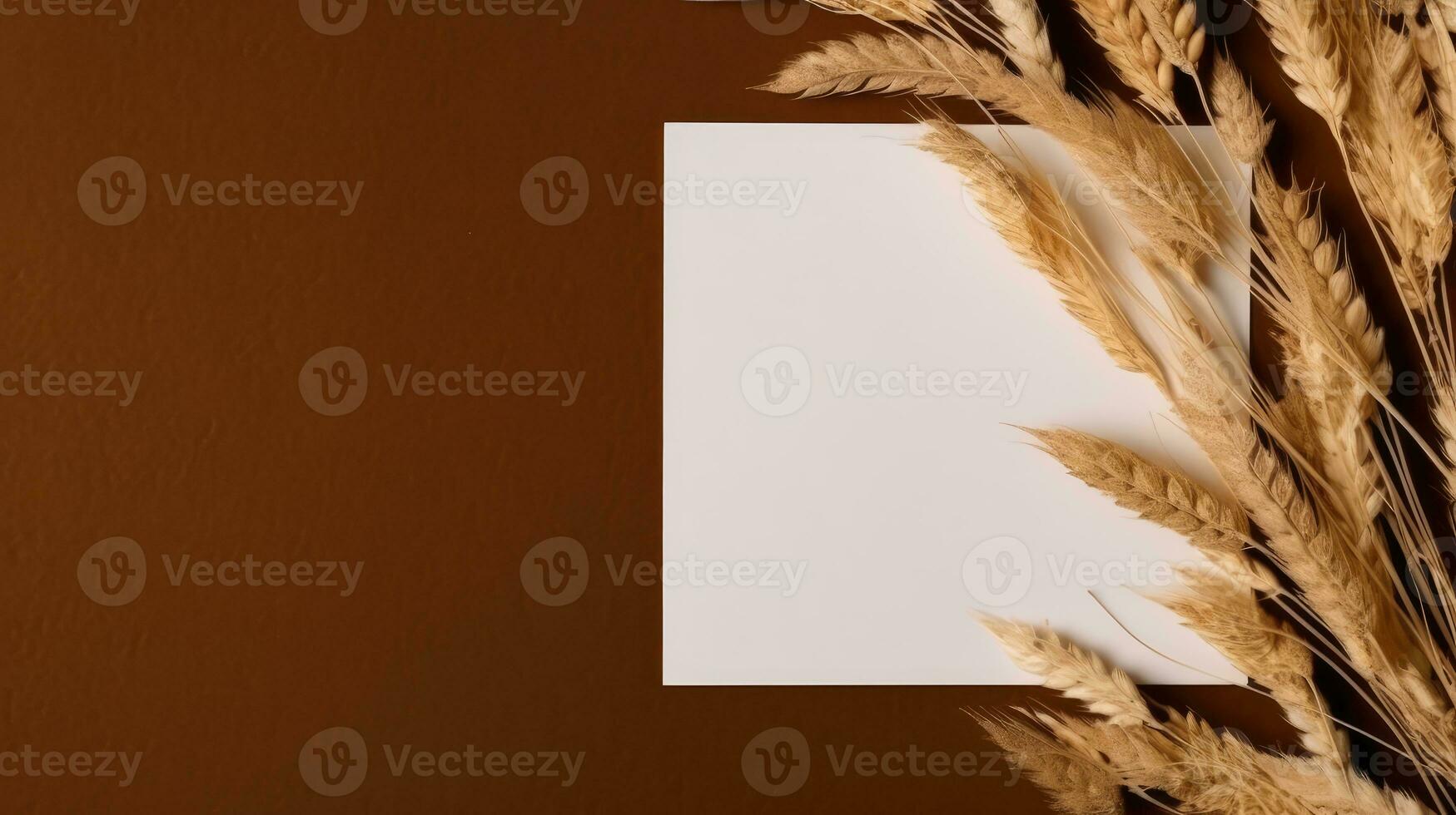 Top View of Blank White Paper with Golden Wheat Branch on Brown Background and Placement. Vintage Delicate Business or Wedding Card Design. Generative AI. photo