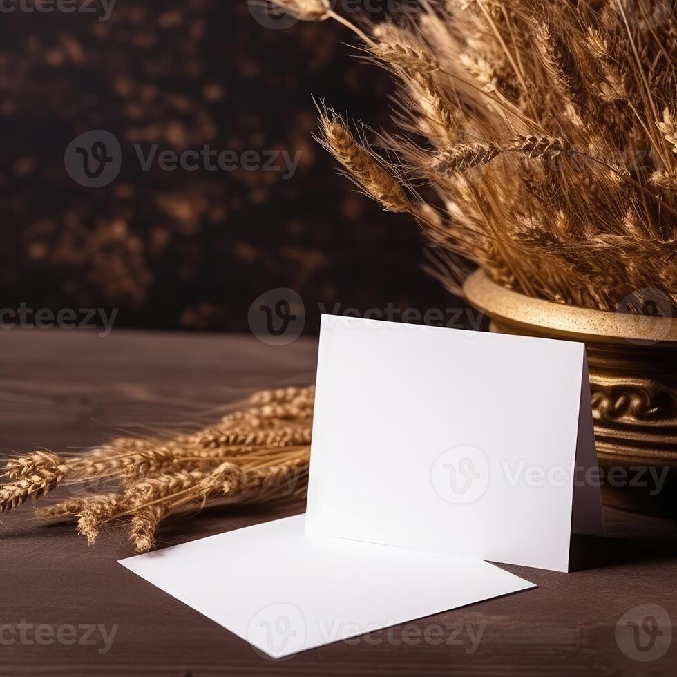 Blank White Invitation Card with Golden Dried Wheat Grass Vase Mockup, . photo