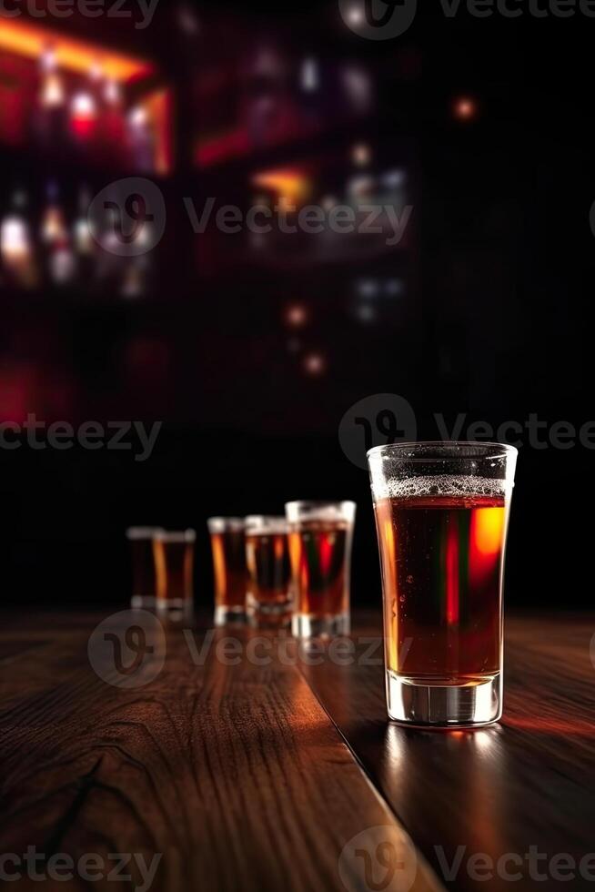 Cold Beer Glasses on Wooden Table. Blurred Interior of Pub at the Background. . photo