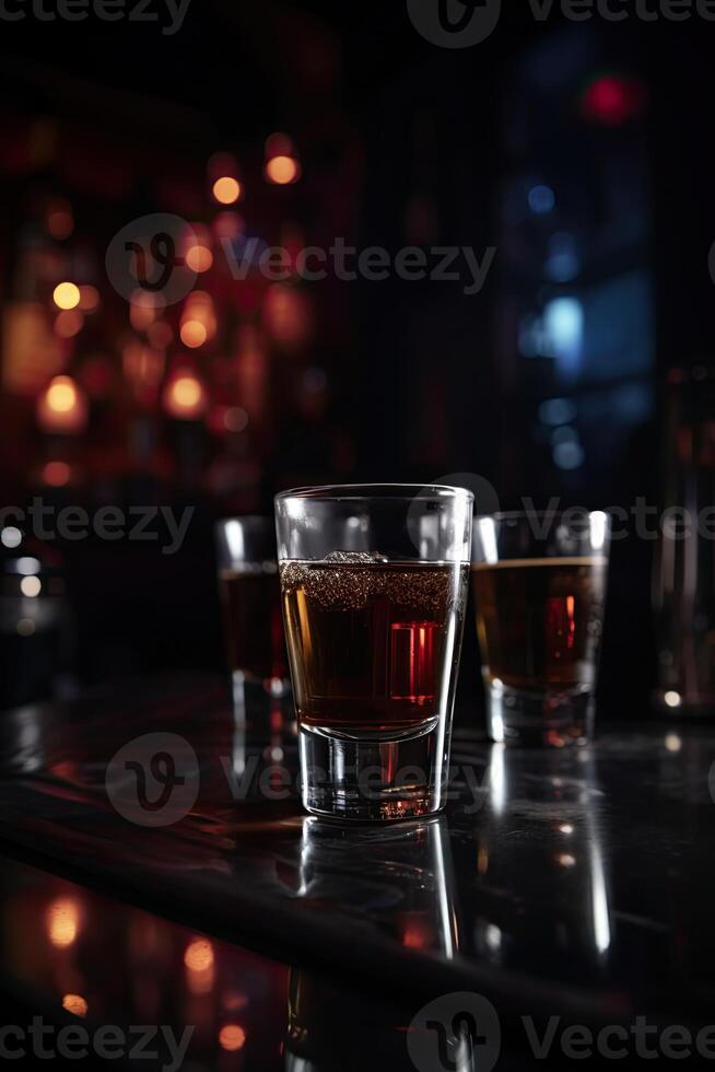 Cold Scotch, Whisky Glasses on Dark Table Background. . photo