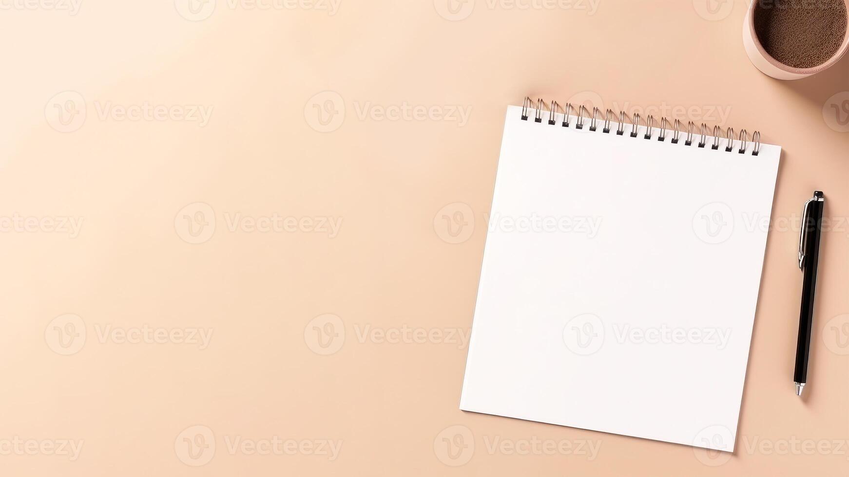 Top View of Blank White Spiral Notepad with Pen, Coffee Cup. . photo
