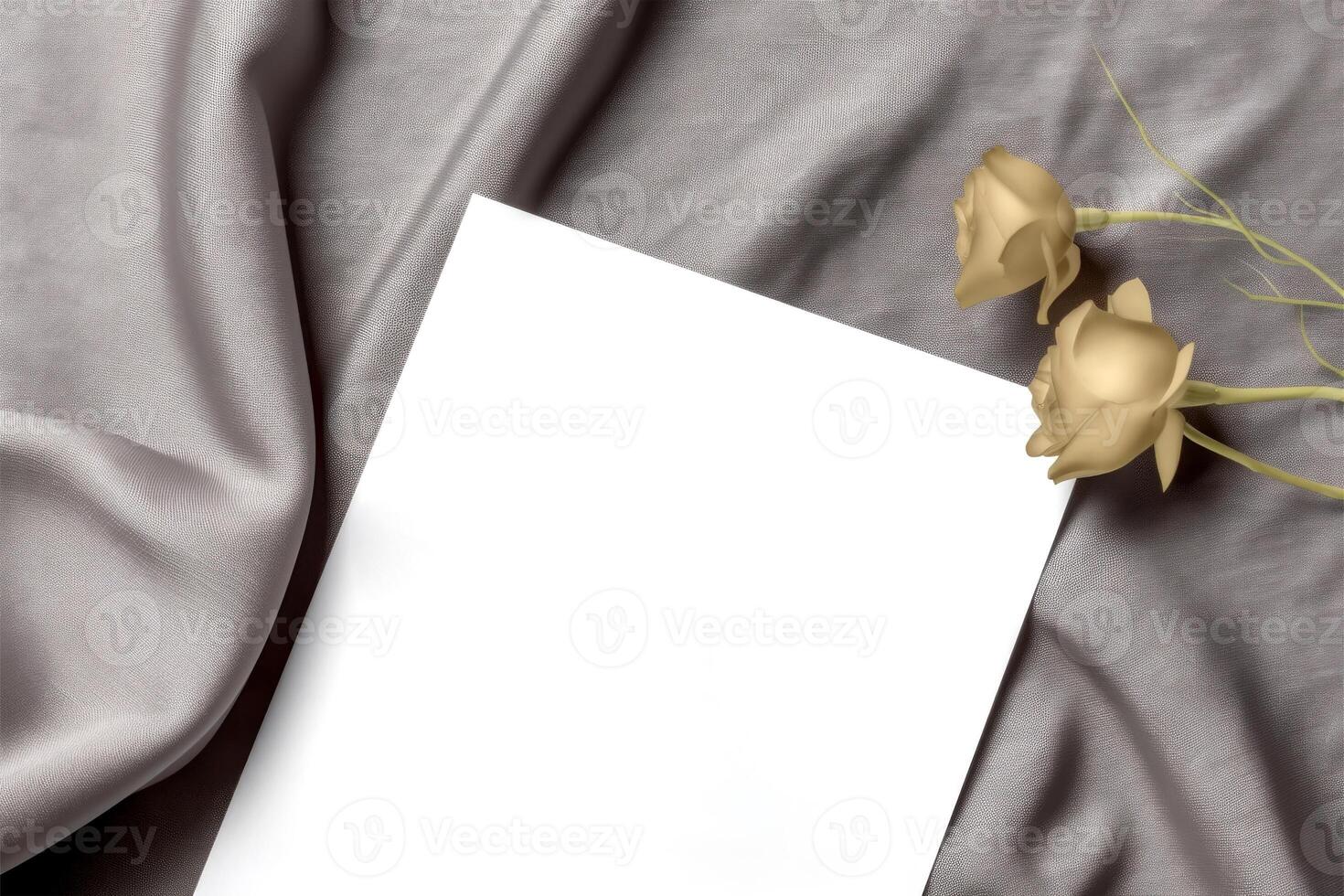 Blank White Paper Card Mockup Flat Lay and Golden Roses on Gray Crumpled Fabric Texture Background, . photo