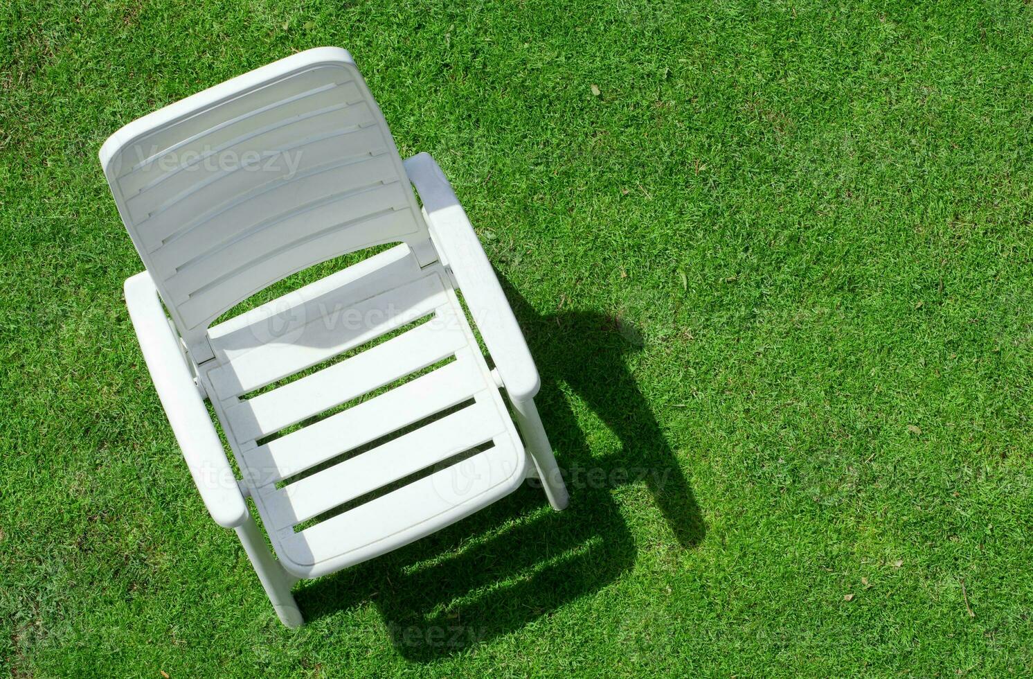 Garden chair on law photo
