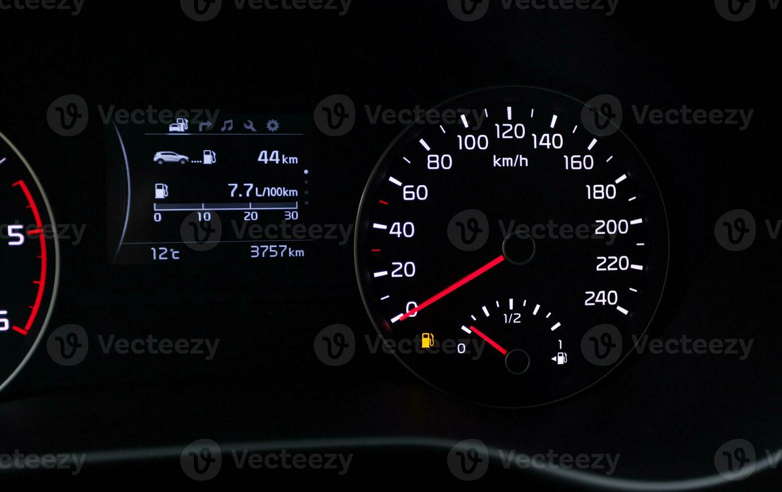 Fuel consumption theme. Empty tank indicator on car dashboard photo