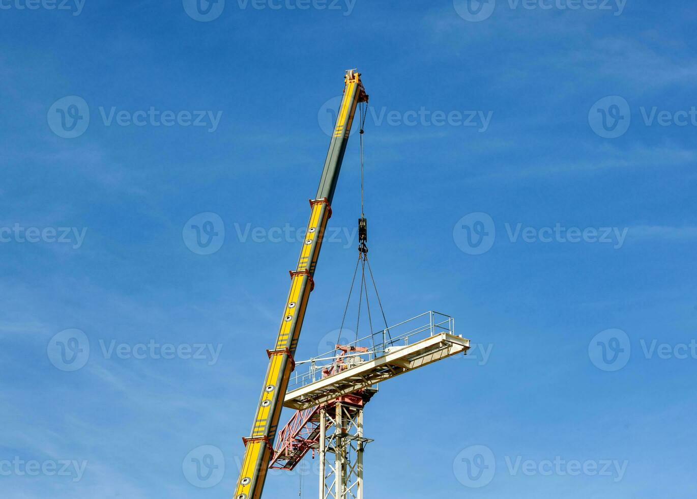 Disassembly of a tower crane photo