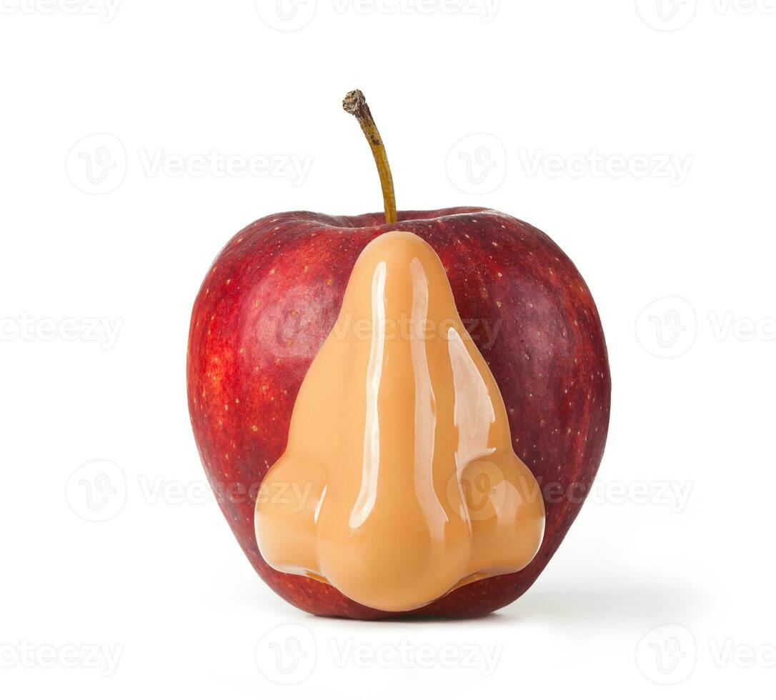 Red apple with nose photo