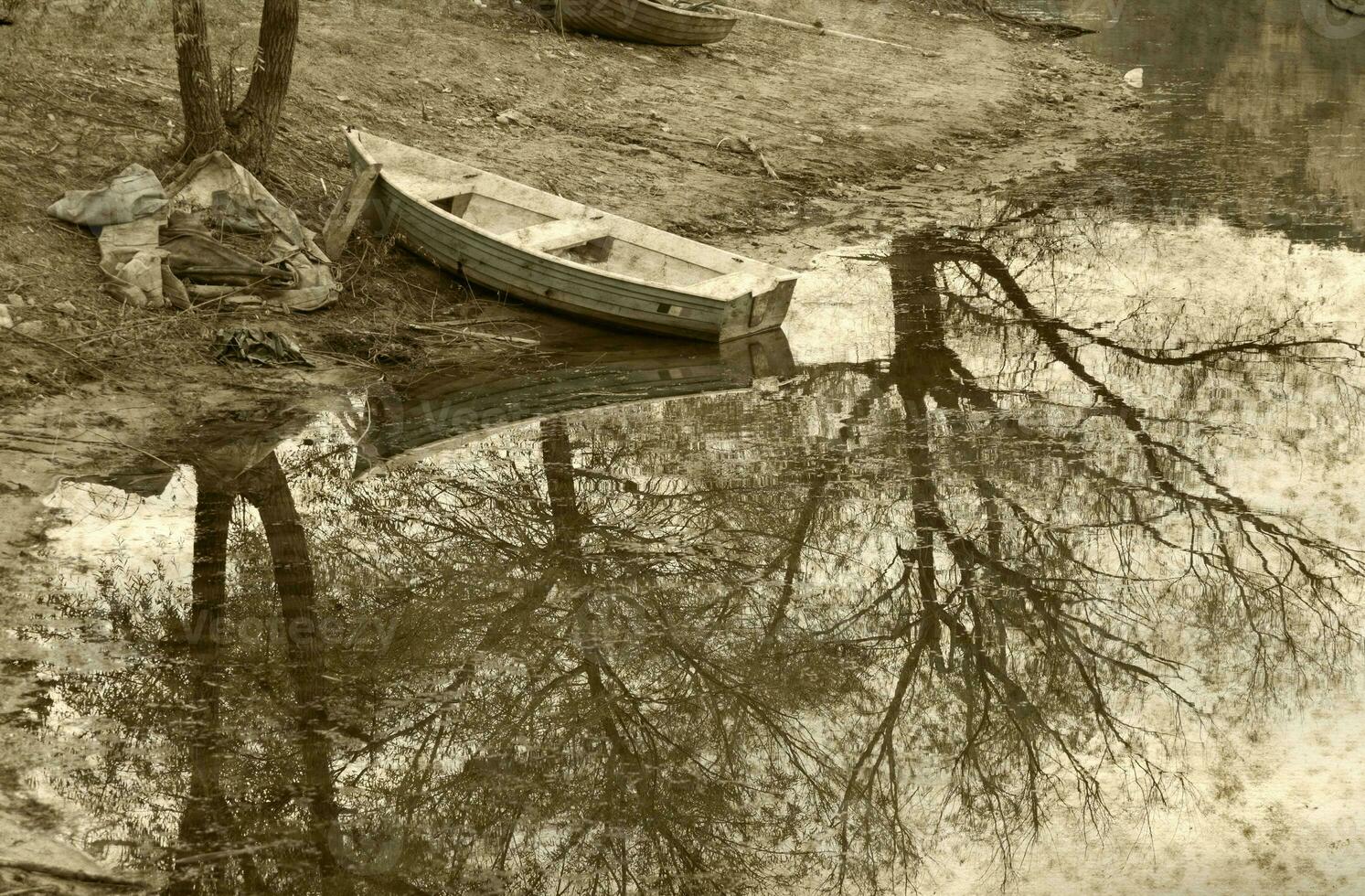 Old boat near the lake photo