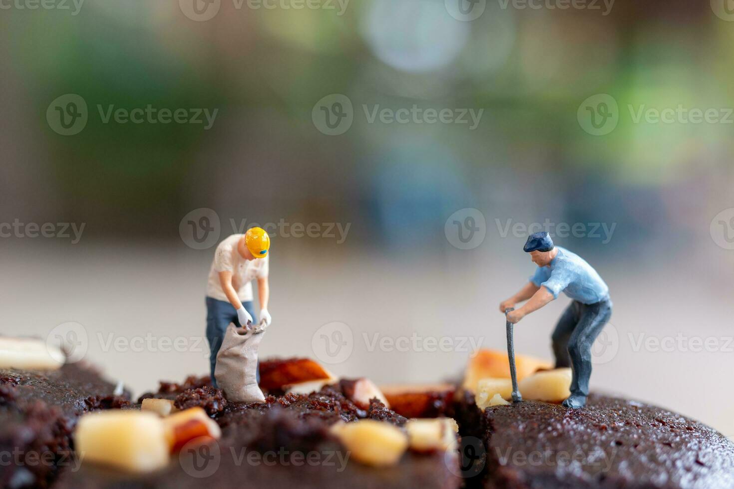 Miniature people, An employee is making a chocolate brownie photo