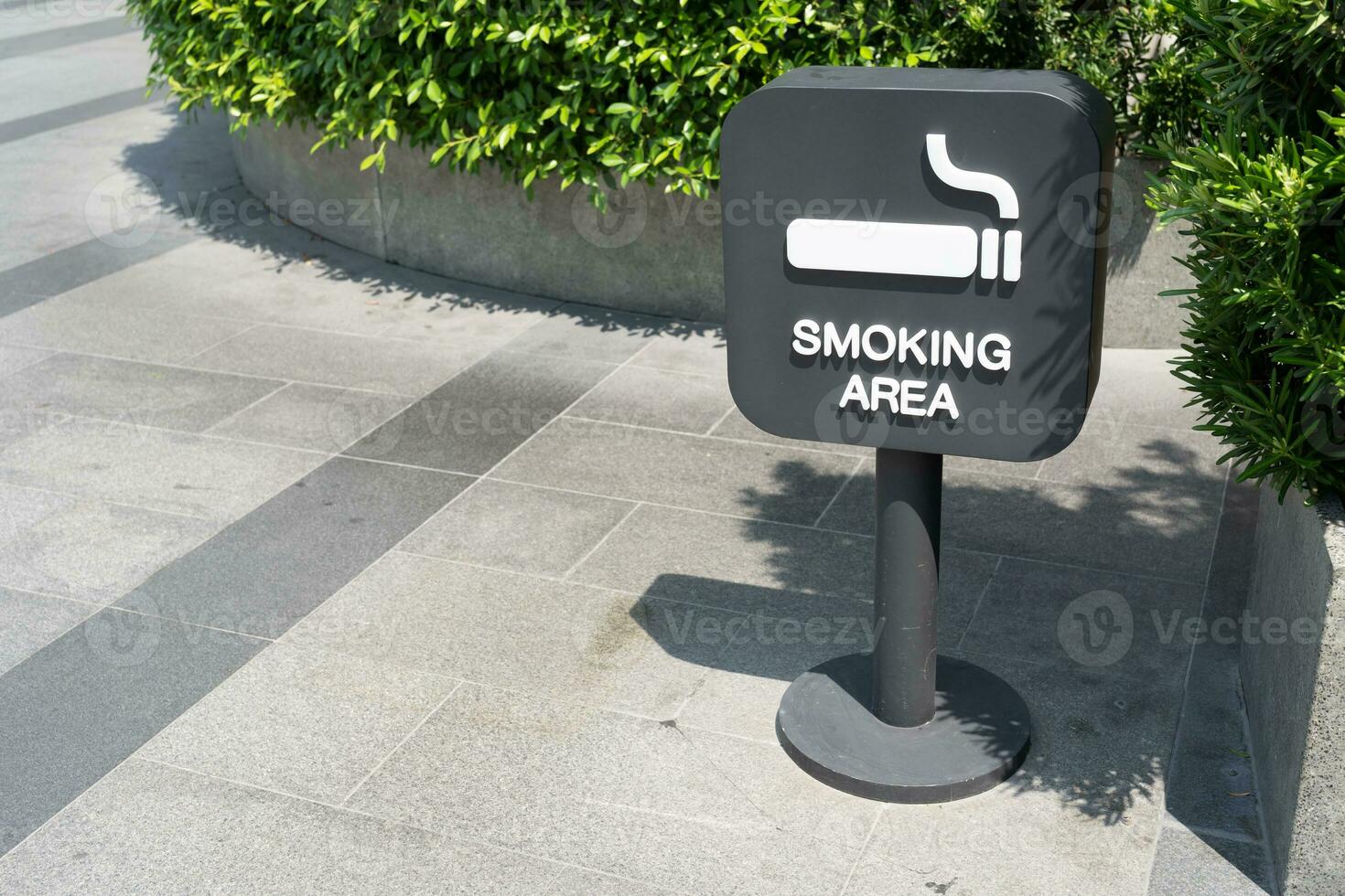 Smoking area sign. open garden area for smoking. photo