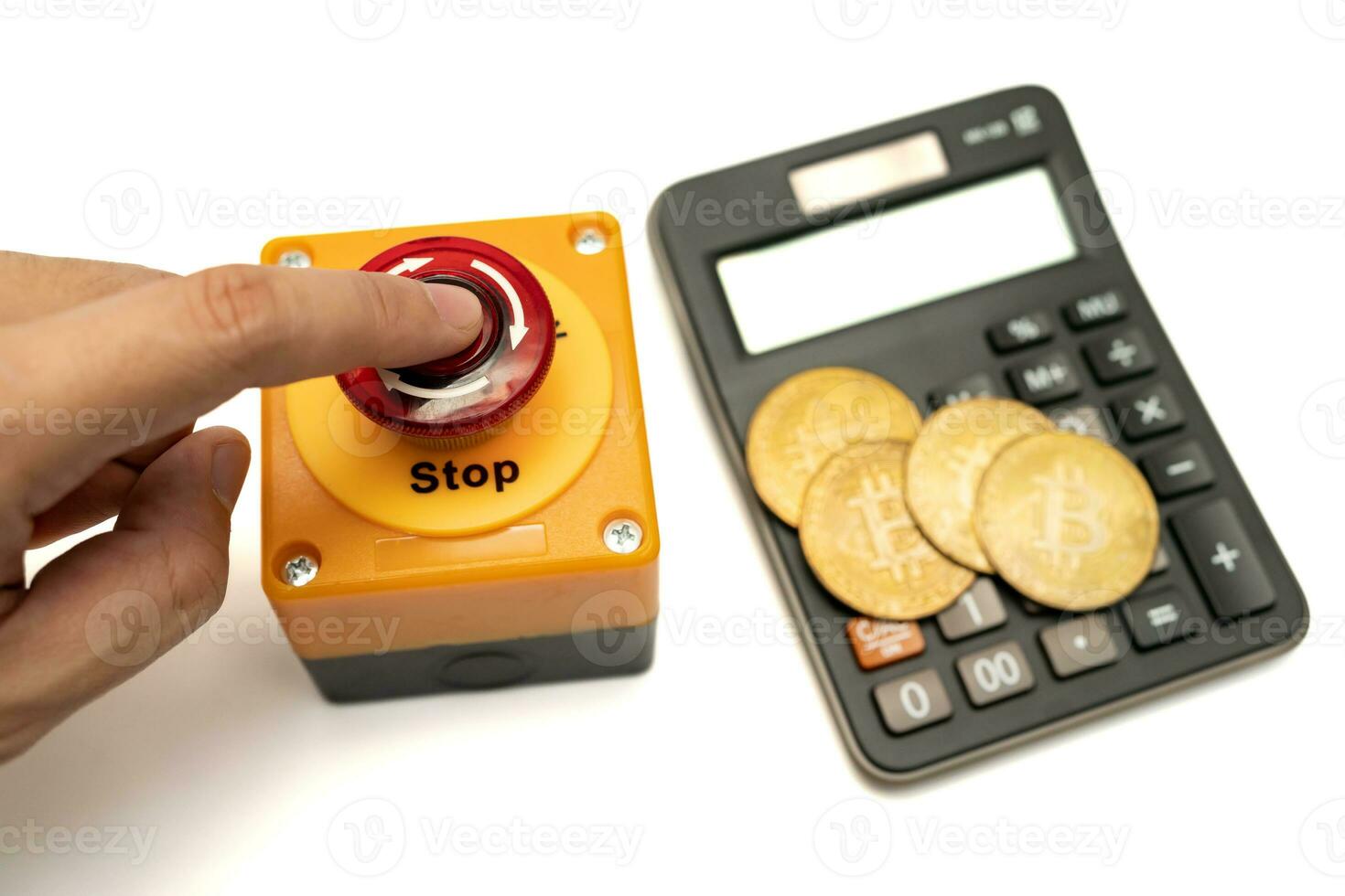 calculator bitcoin and stop button isolated on white background, calculation of profitability. financial disaster and crisis protection when market price fall. photo