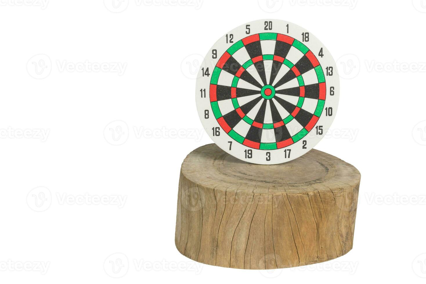 Dartboard hanging on old wooden photo